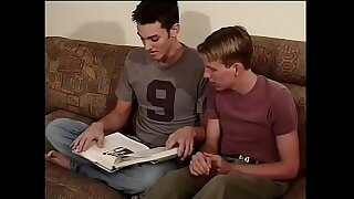 Slim young gay blonde in white socks rides his dark haired friend's hard cock